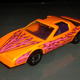 Hot Wheels - blindingly vibrant Pontiac Firebird with orange paint and pink lightning! :D